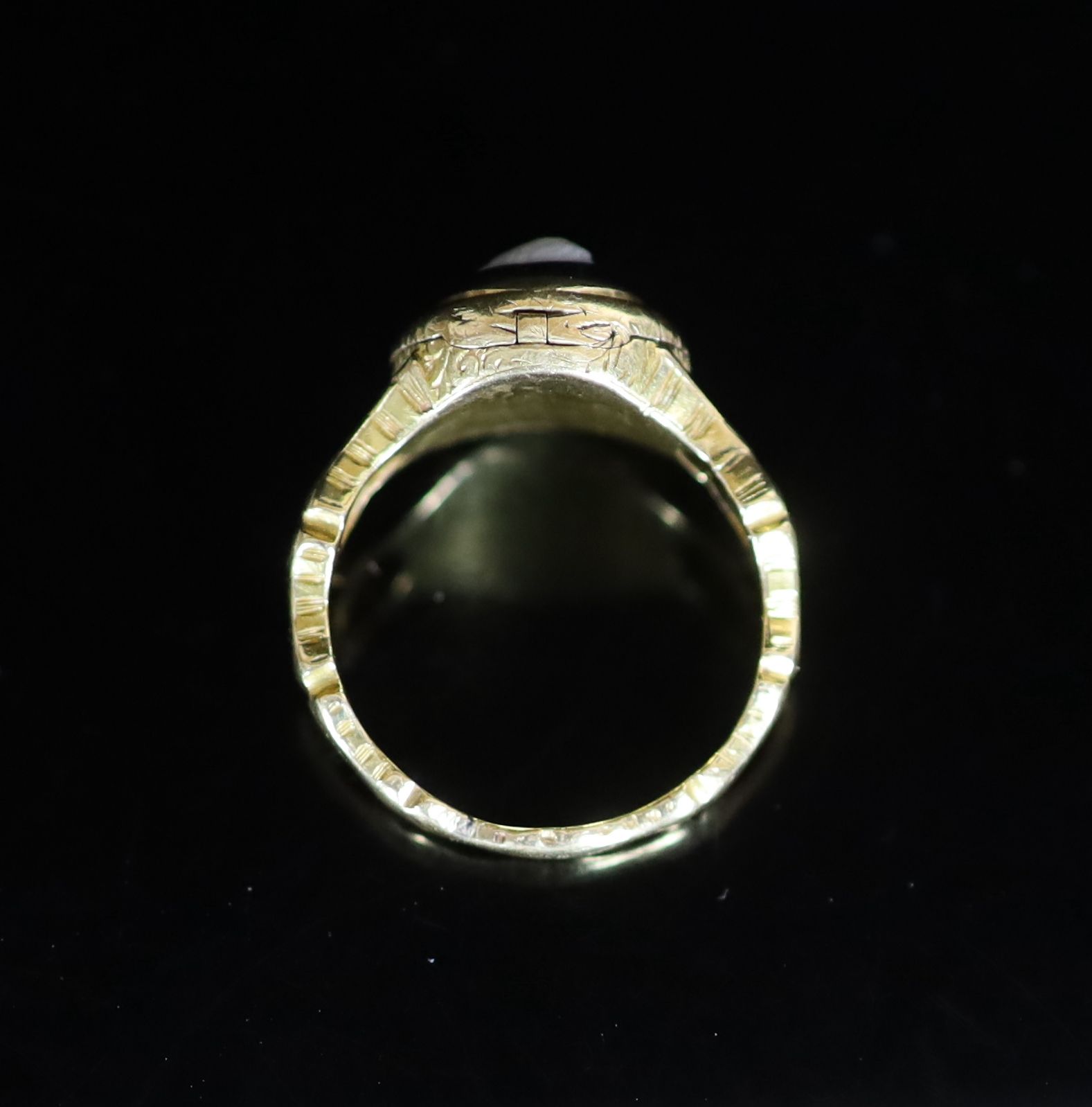 An early 19th century gold and cameo set poison ring